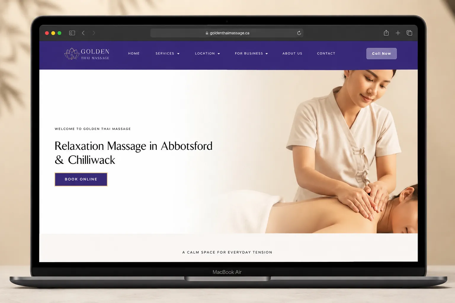 Golden Thai Massage website on laptop displaying service pages and online booking.