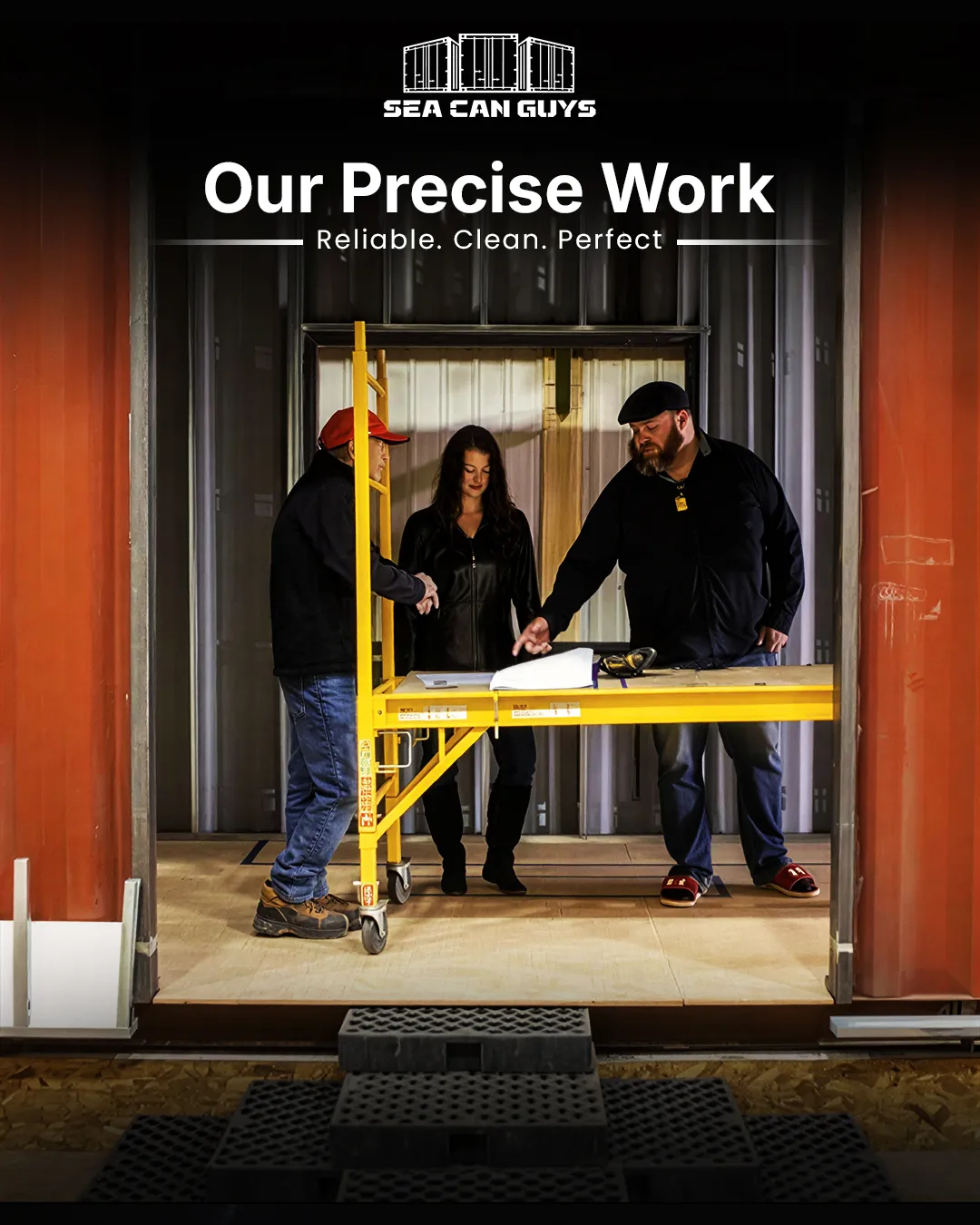 Sea Can Guys team inspecting modified shipping container, demonstrating reliable work and container solutions.